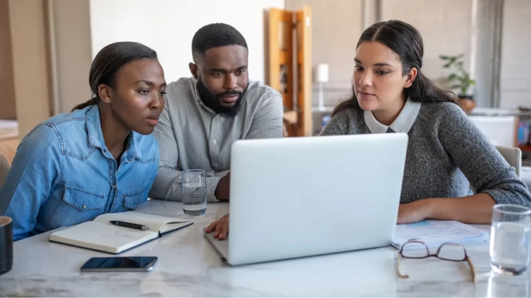 Diverse team working together during an office meeting.